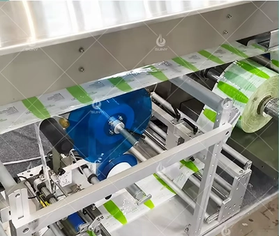 Punching and labeling of packaging film